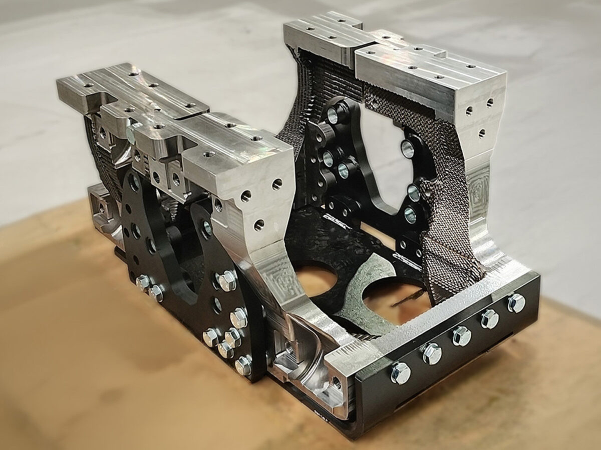 3D printed metal suspension and differential carrier for the NP Aerospace Mastiff, with machined mounting interfaces